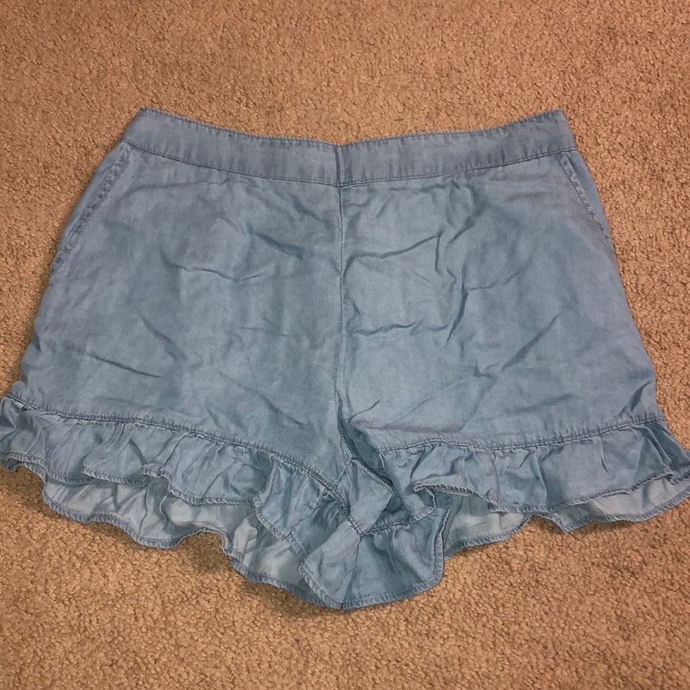 Chambray ruffled shorts.